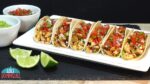 ¡Descubre la auténtica presentación de tacos mexicanos en solo 70 caracteres!
